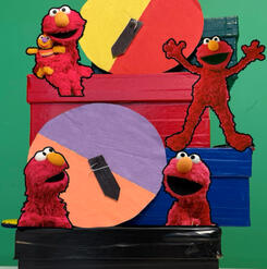 Elmo on boxes, spinners